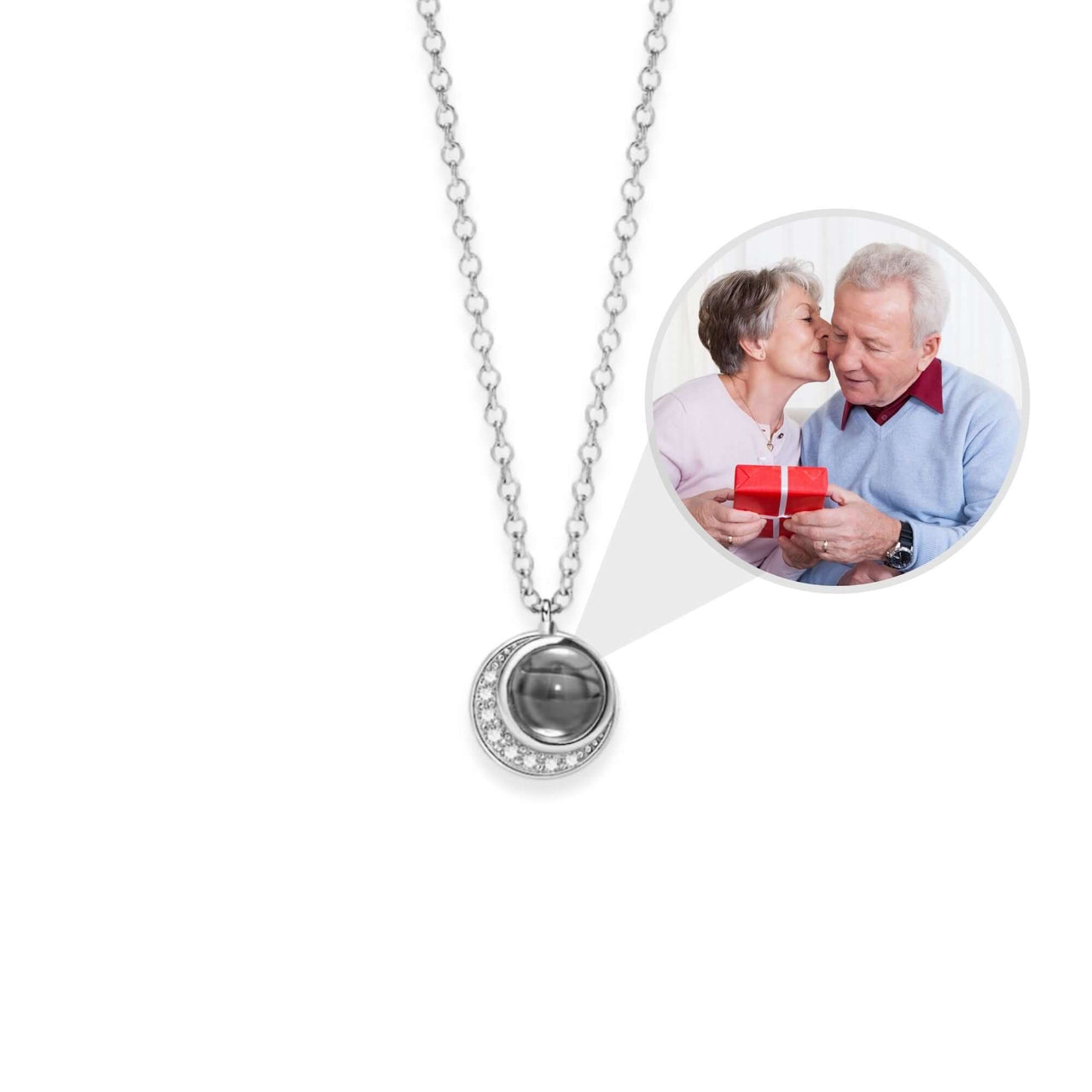 Moonlight Photo Necklace by Brother & Sisters with a moon-shaped pendant holding a cherished photo.