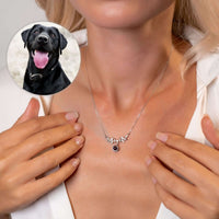 Thumbnail for Nature Photo Necklace worn by a woman, featuring a personalized photo charm showcasing a black dog, by Brother & Sisters.