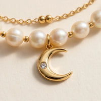 Thumbnail for Pearl Moon Anklet Set featuring gold crescent moon charm and cream freshwater pearls, perfect for a subtle luxurious touch by Brother & Sisters.