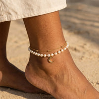 Thumbnail for Pearl Moon Anklet Set featuring 18K gold and cream freshwater pearls, by Brother & Sisters, embodying quiet luxury.
