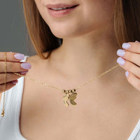 Thumbnail for Child Name Necklace worn by a woman, featuring custom name design and gold finish, by Brother & Sisters.