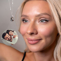Thumbnail for Phoenix Photo Necklace worn by a woman, showcasing a personal photo charm from Brother & Sisters.