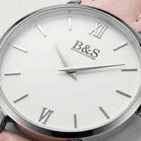 Thumbnail for Pink Love dial macro — B&S Brother & Sisters logo close-up