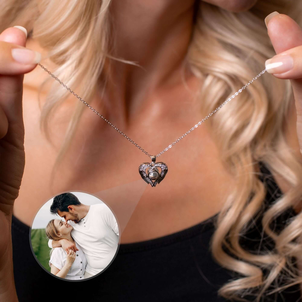 Precious Heart Photo Necklace by Brother & Sisters held by a woman, featuring customizable heart-shaped photo insert.