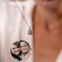 Thumbnail for Rare Photo Necklace by Brother & Sisters featuring a personal photo projection pendant.