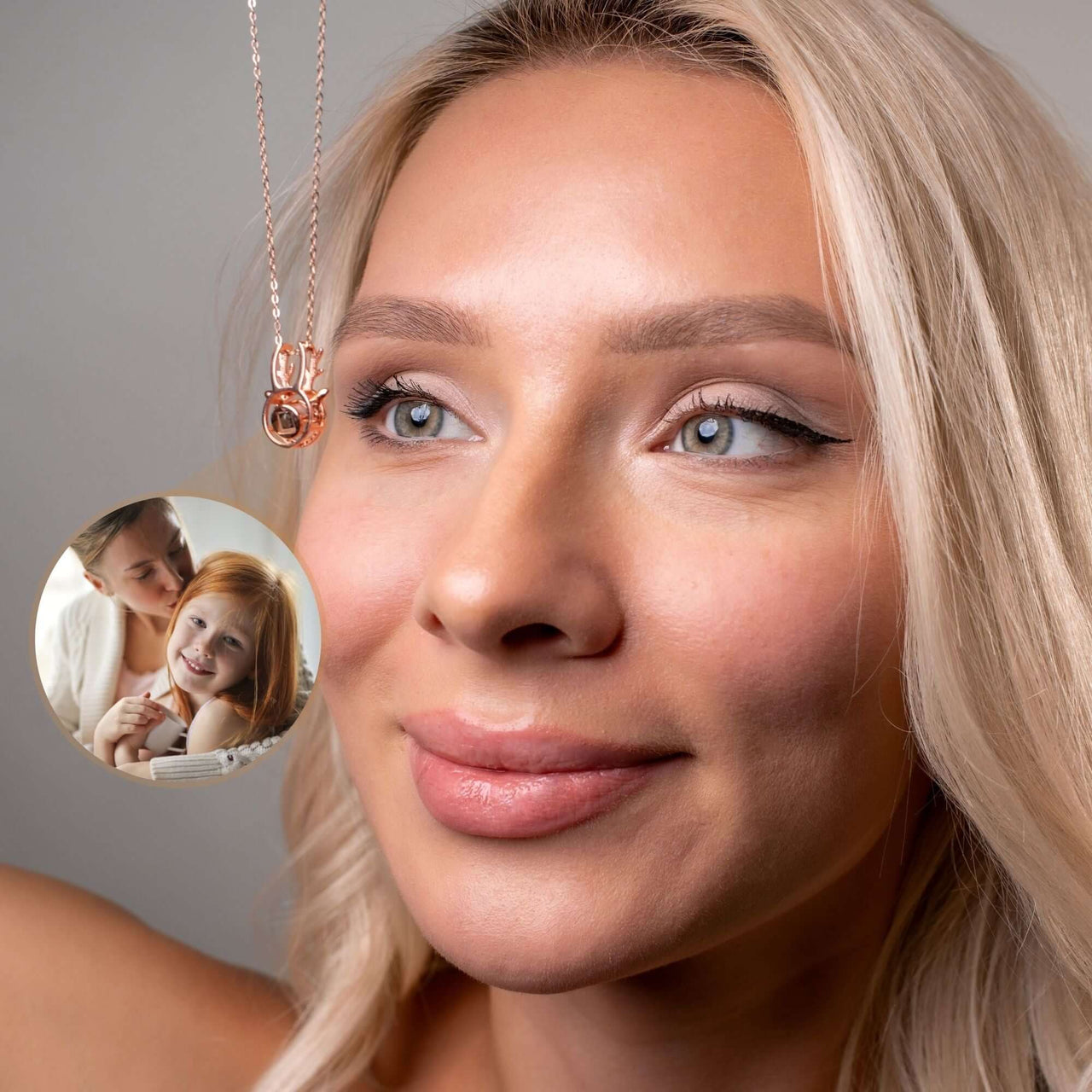Woman wearing a Reindeer Photo Necklace by Brother & Sisters, showcasing a personal photo in a festive design.