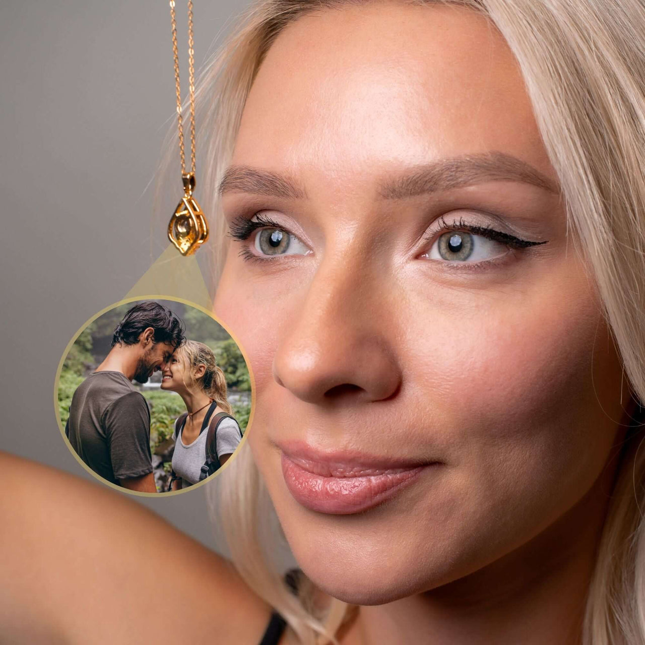 Reversed Heart Photo Necklace worn by a woman, showcasing a beautiful photo of a couple inside the pendant.