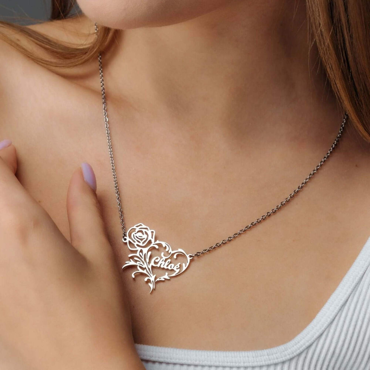 Rose Name Necklace featuring a personalized design with a rose and the name Chloe in silver by Brother & Sisters.