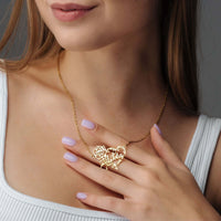 Thumbnail for Rose Name Necklace worn by a woman, featuring a heart design with a rose, personalized for individuality by Brother & Sisters.