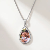 Thumbnail for Secret Drop Photo Necklace in silver, teardrop pendant on a box chain showing the hidden photo | SKU: TPH-DRPN-SILVER