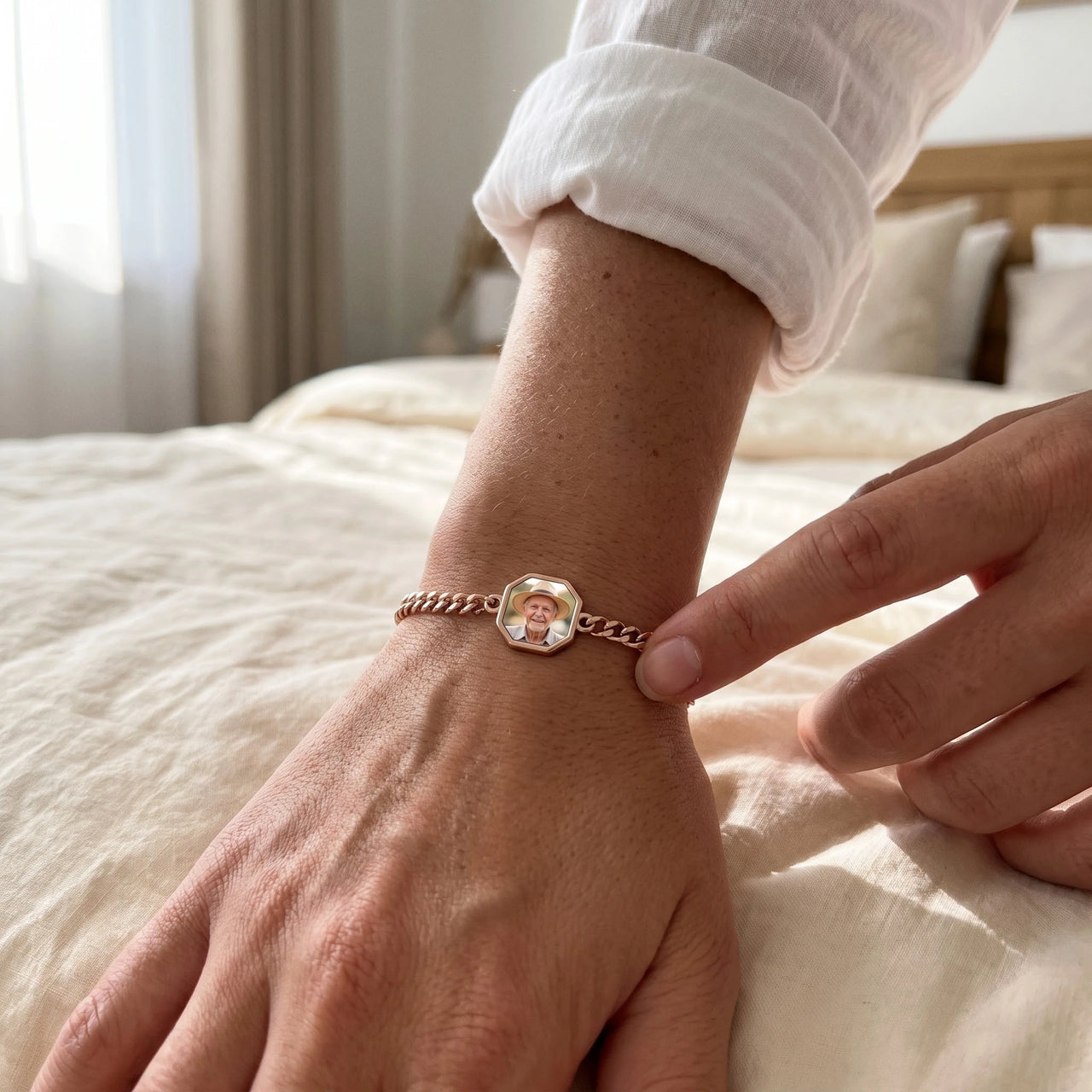Warming the rose gold octagon photo bracelet with a thumb, her grandfather's photo appears | SKU: TPH-OCTB-ROSEGOLD-18