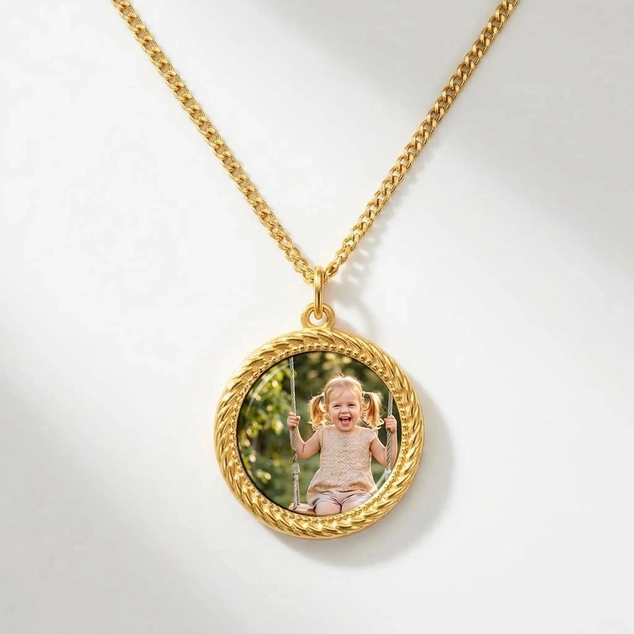 Secret Round Photo Necklace in gold, black round pendant turning into a hidden photo when warmed | SKU: TPH-RNDN-GOLD