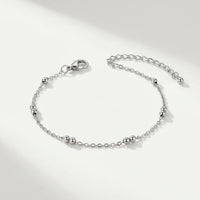 Thumbnail for Silver Bead Anklet by Brother & Sisters, featuring delicate wire-thin chain and polished silver beads for summer elegance.
