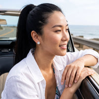 Thumbnail for Woman relaxing on holiday wearing the silver stud earrings | SKU: 19991927