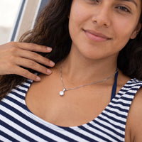 Thumbnail for Woman relaxing on holiday wearing the silver necklace | SKU: 505665