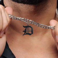 Thumbnail for Man showcasing Brother & Sisters Unique Initial Necklace with a stylish letter pendant on a silver chain.