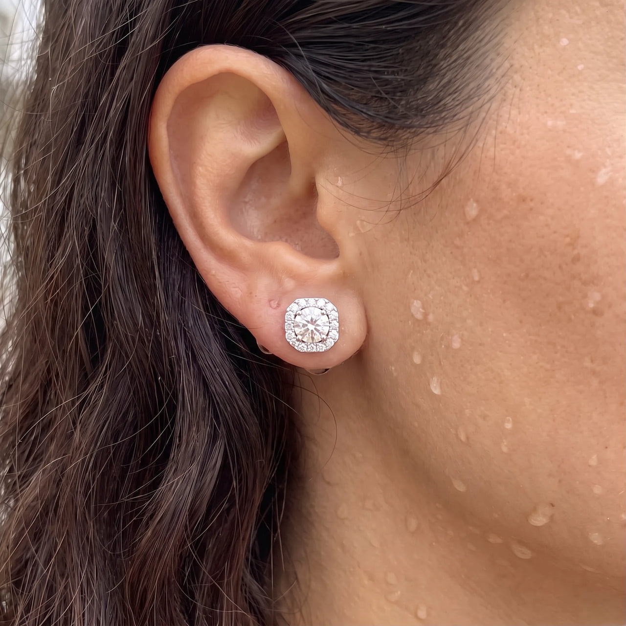 Close-up of the silver stud earrings worn on the skin | SKU: 505263