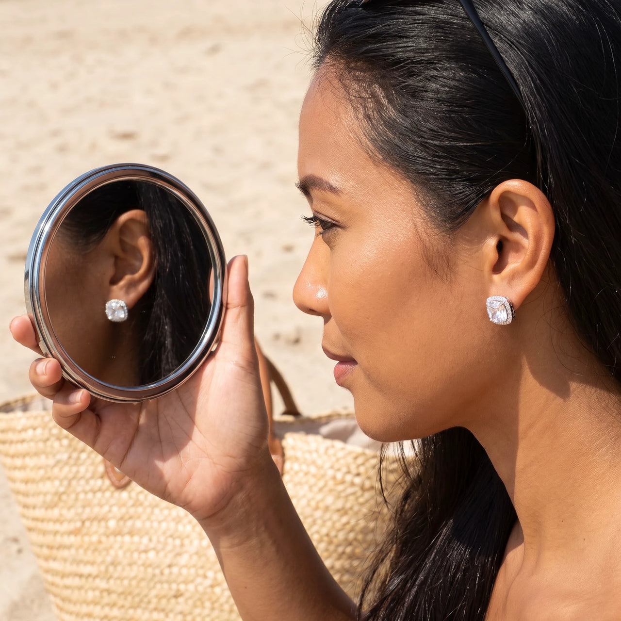 Silver stud earrings worn, showing its real size | SKU: 505185-white