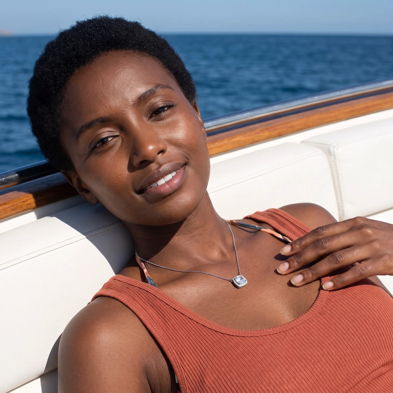 Woman relaxing on holiday wearing the silver necklace | SKU: 505721