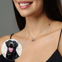 Thumbnail for Square Photo Necklace by Brother & Sisters featuring a close-up of a woman wearing the necklace with a dog photo charm.