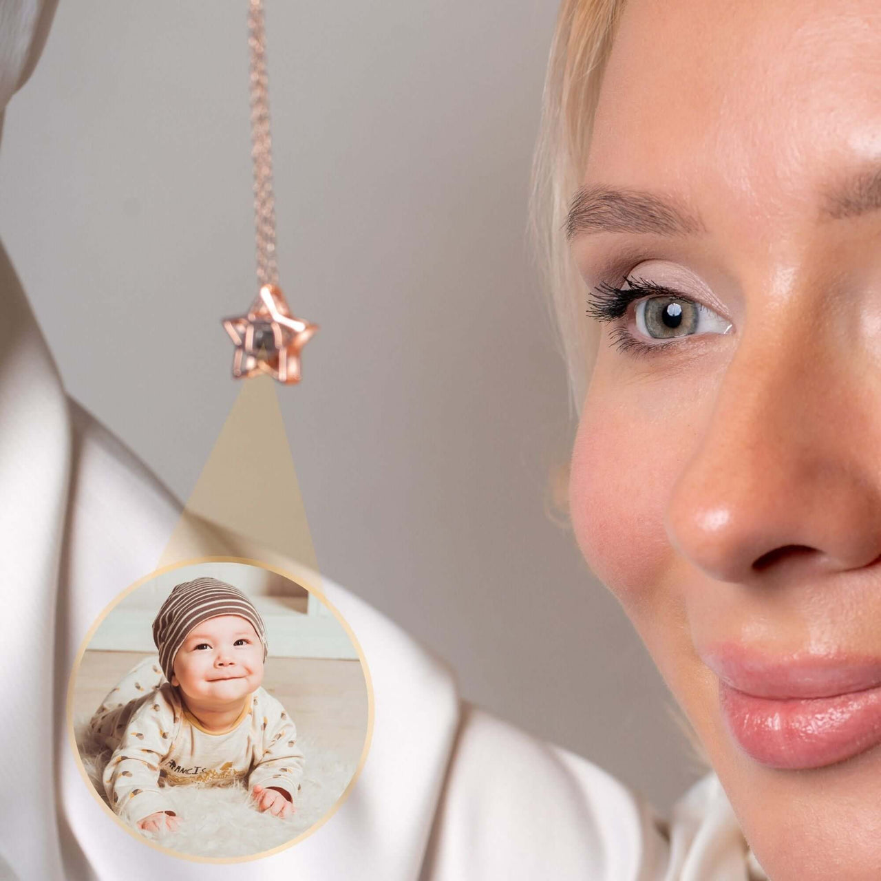 Star Photo Necklace featuring a hidden photo projection of a baby, designed by Brother & Sisters, elegant keepsake jewelry.