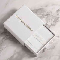 Thumbnail for White gift box from Brother & Sisters for Sun Photo Necklace, featuring elegant branding.