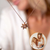 Thumbnail for Sun Photo Necklace by Brother & Sisters features a customizable charm with a photo viewable in light.