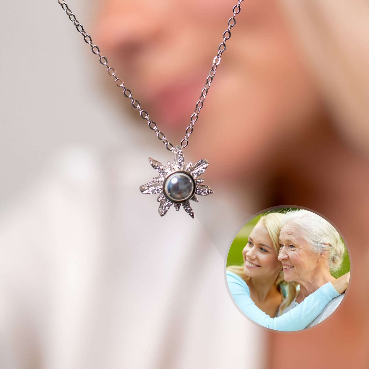 Close-up of Sun Photo Necklace by Brother & Sisters featuring a sun design and customizable photo feature.