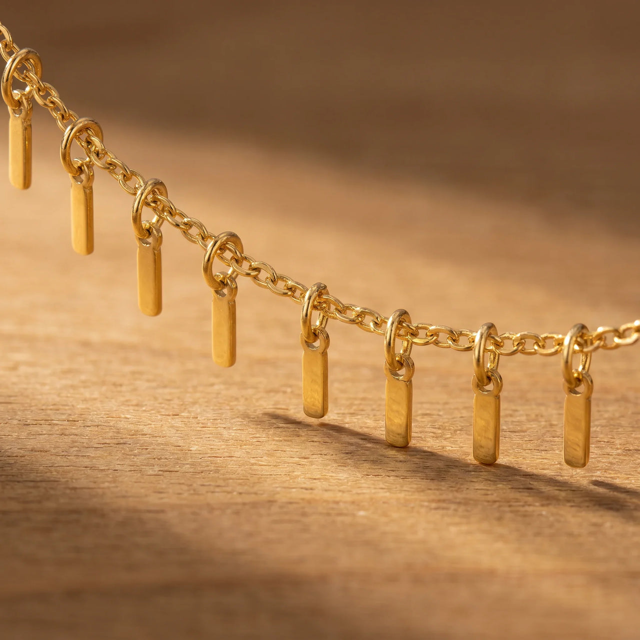 Sun Ray Fringe Anklet with gold cable chain and tiny rectangular pendants, perfect for summer styling by Brother & Sisters.
