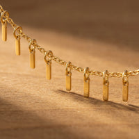 Thumbnail for Sun Ray Fringe Anklet with gold cable chain and tiny rectangular pendants, perfect for summer styling by Brother & Sisters.