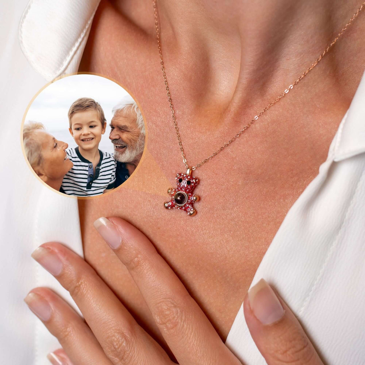 Teddy Bear Photo Necklace showing a woman wearing a sentimental projection jewelry with a family photo in the background.
