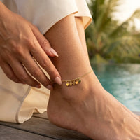 Thumbnail for Delicate Tiny Heart Drop Anklet by Brother & Sisters, featuring tiny heart drops on a gold chain, perfect for everyday wear.
