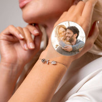 Thumbnail for Tulip Photo Bracelet featuring a delicate tulip charm and a hidden photo projection by Brother & Sisters.