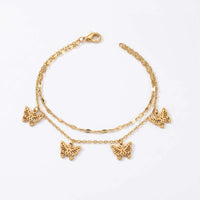 Thumbnail for Butterfly layered anklet in gold stainless steel, four openwork butterfly charms, 22 cm, lobster clasp, on white background.