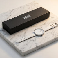 Thumbnail for White Purity gift box and watch 45deg angle on marble — option C