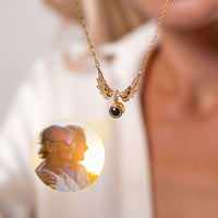 Thumbnail for Wings Photo Necklace from Brother & Sisters featuring personalized photo encased in angel wings.